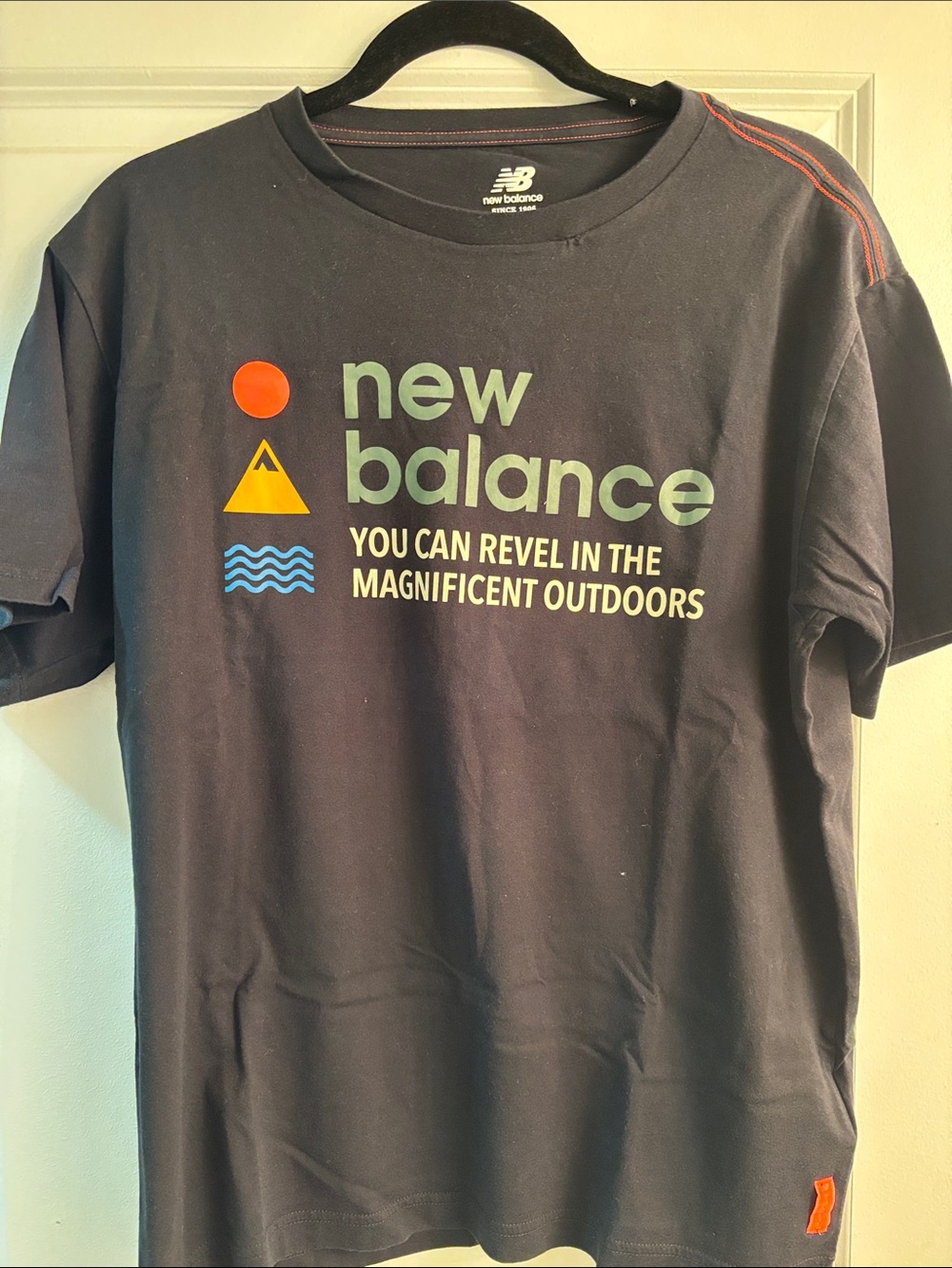 New Balance Men’s Navy Short-Sleeve Logo Tee with Multicolor Icons